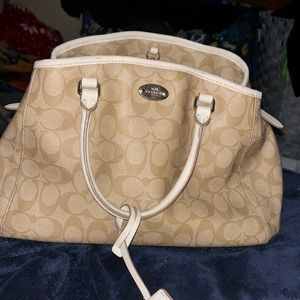 real coach purse could use a little cleaning in the inside